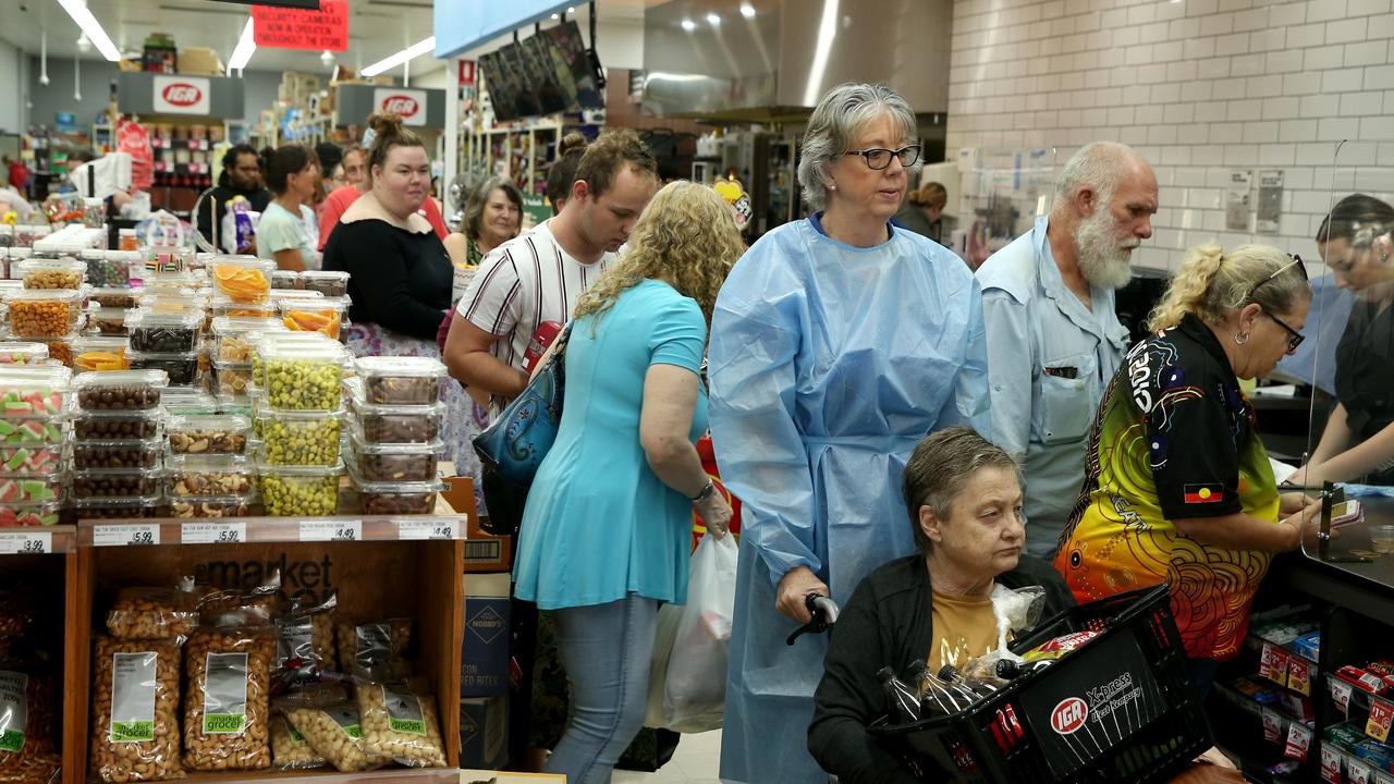 Heavy rain continues to batter the NSW mid north coast causing major flooding. Kempsey residents line up at the IGA for supplies at the only supermarket left open . Nathan Edwards