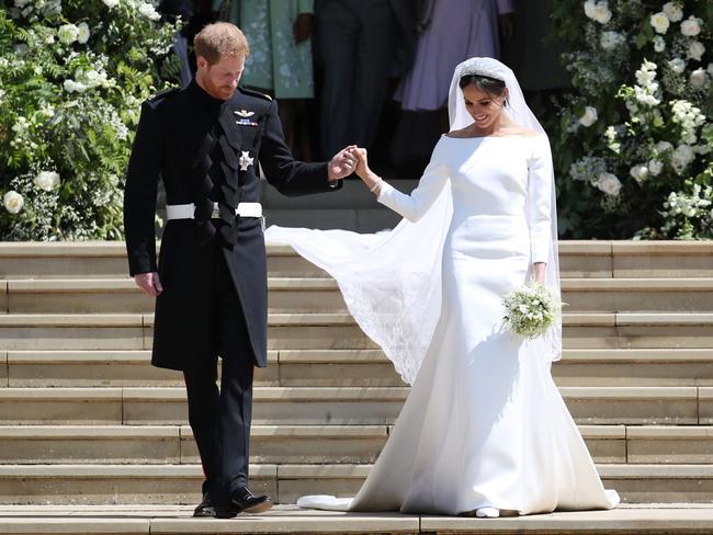 Prince Harry, the Duke of Sussex and the Duchess of Sussex, on the steps of St George's Chapel at Windsor Castle. Picture: Jane Barlow/Getty Images