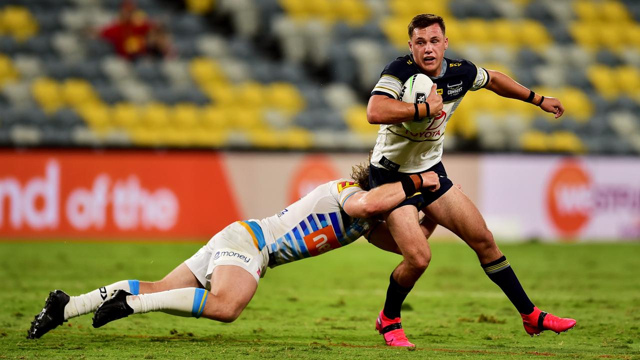 ALMOST CLEAR: Cowboy’s Scott Drinkwater against the Titans in Townsville last weekend. Picture: Alix Sweeney