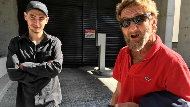 LOST CAR: Unlicensed driver Timothy Horne, 22 and his not-so happy dad Robert Horne leave Ipswich Courthouse. Timothy was charged while driving his dad's car to buy milk. Picture: Ross Irby