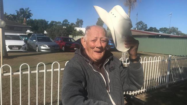 Giving a wave: Gary Ostrofski has become famous around Bundaberg for waving to cars travelling past FE Walker St.