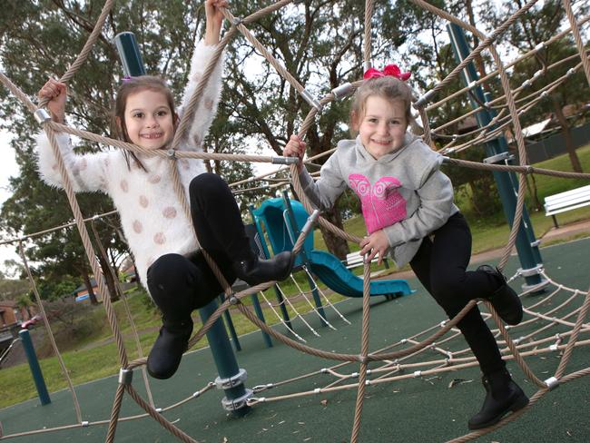 Sisters Lara and Kenzie Spires at Quirk Reserve in Bradbury after it was upgraded in 2017. Picture: Robert Pozo