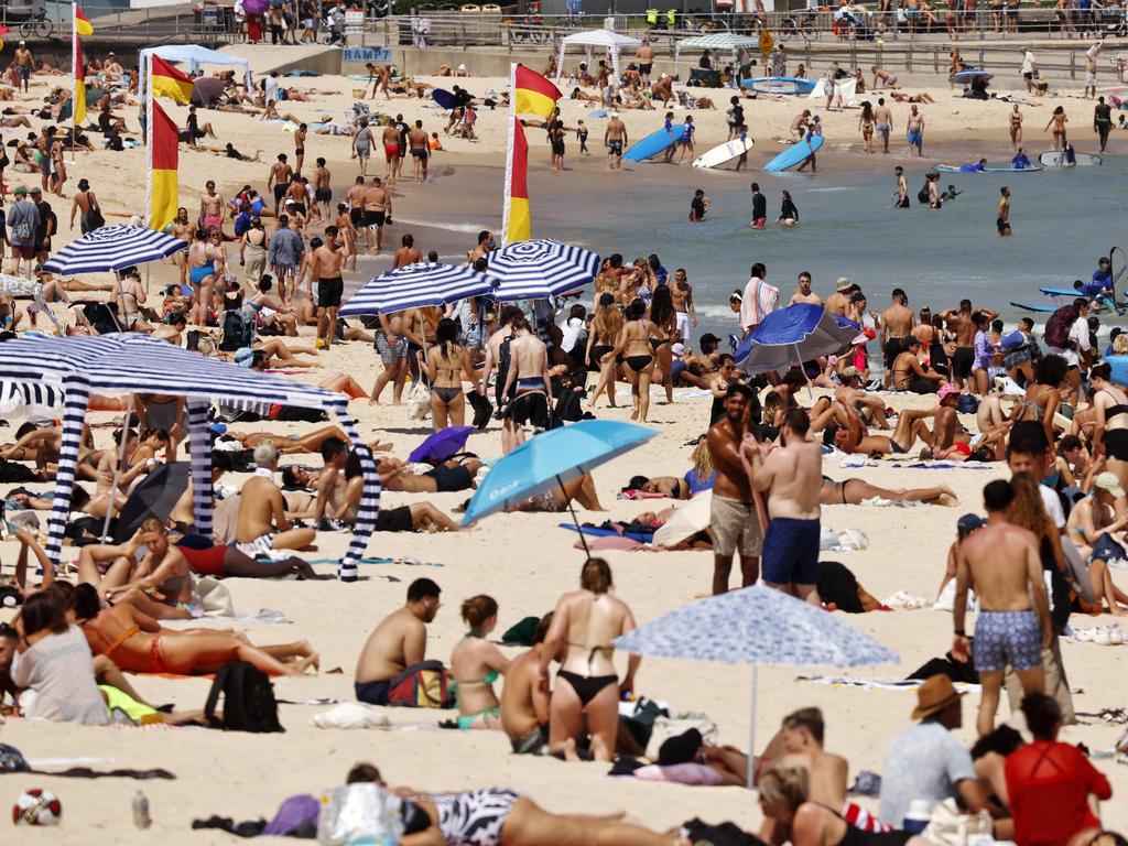 Sydneysiders at Bondi Beach find relief from the heat as the state’s fragile energy grid was pushed to its limits. Picture: Sam Ruttyn