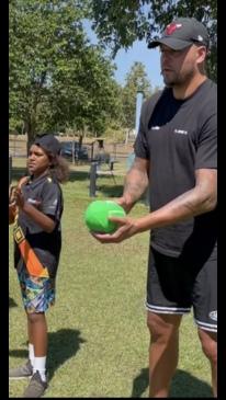 Lance ‘Buddy’ Franklin running Auskick drills at Anula Primary School