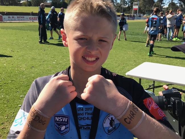 Adam Wallace on grand final day. he ran out with Chris Lawrence’s name written on his wrist tape. Picture: Supplied