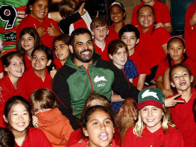 South Sydney Rabbitohs player Greg Inglis with students at Darlington Public School at a Colgate Oral Care session to learn about healthy living including dental care. Picture: John Appleyard