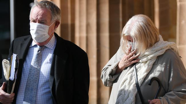 Rosa Maria Maione leaves court with her lawyer, Stephen Ey, after pleading guilty to manslaughter. Picture: Mark Brake