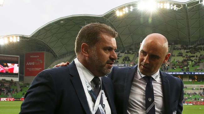 Ange Postecoglou with Melbourne Victory coach Kevin Muscat.