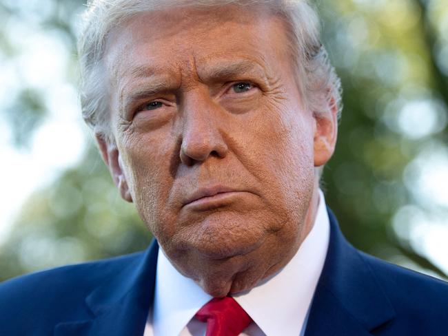 (FILES) In this file photo former US President Donald Trump speaks to the media prior to departing from the South Lawn of the White House in Washington, DC, September 21, 2020, as he travels to Ohio. - The US Supreme Court on February 22, 2021 denied a bid by Donald Trump to prevent his tax records from being handed over to prosecutors in New York. The nation's highest court denied the request filed by lawyers for the former president without comment.Trump has been waging a protracted legal battle to prevent his tax records from being handed over to Manhattan District Attorney Cyrus Vance. (Photo by SAUL LOEB / AFP)