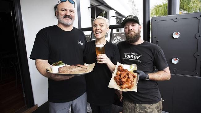 Owners David Ferguson (L) and Anita Boettger with BBQ master chef Ryan Lane posing at Easy Times Brewing Co, 20 Logan Rd, Woolloongabba, Brisbane, 22nd of October 2020. (News Corp/Attila Csaszar)