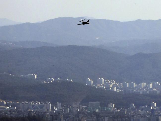 A US Air Force B-1B bomber flies near the Seoul Airport near a site for the 2017 Seoul International Aerospace and Defence Exhibition. Picture: Yonhap via AP