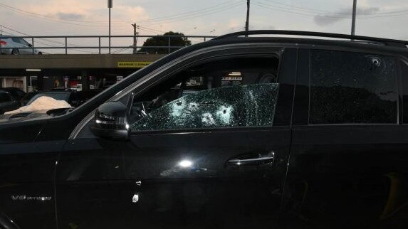 Bullet holes in the window of slain ex-bikie boss Mick Hawi’s car.