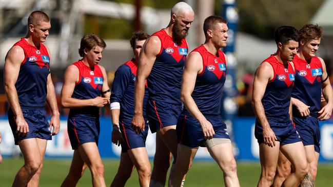 ALICE SPRINGS, AUSTRALIA - JUNE 02: The Demons walk off at half time during the 2024 AFL Round 12 match between the Melbourne Demons and the Fremantle Dockers at TIO Traeger Park on June 02, 2024 in Alice Springs, Australia. (Photo by Michael Willson/AFL Photos via Getty Images)