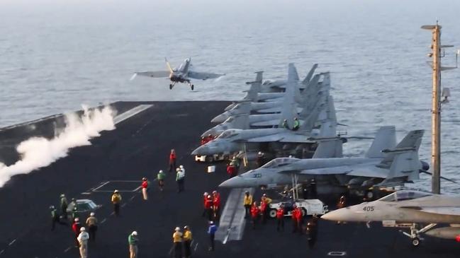 An aircraft launches from the USS Harry S. Truman in the Red Sea before airstrikes in Sanaa, Yemen. Picture: US Navy via AP.