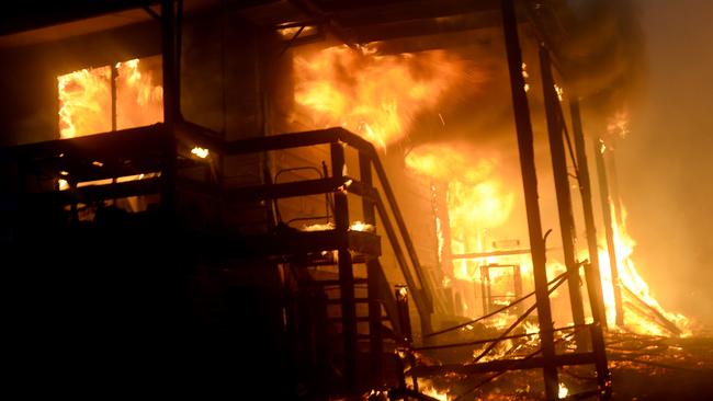 *FILE PIX* NCA NewsWire Photos: Residents and firefighters fight a bushfire that has threatened homes in Rainbow Flat on NSW Mid North Coast. Picture: NCA NewsWire / Jeremy Piper