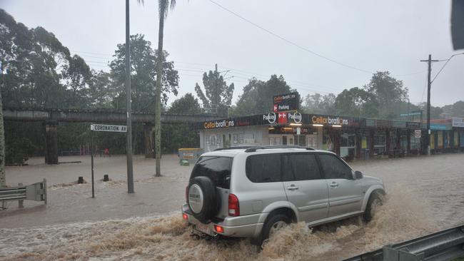 Bridge over Petrie Creek at Currie Street goes under January 2011. Photo: Brett Wortman / Sunshine Coast Daily