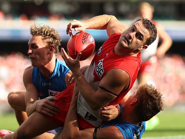 SYDNEY, AUSTRALIA - APRIL 21: Tom Papley of the Swans is tackled by Sam Clohesy of the Suns during the round six AFL match between Sydney Swans and Gold Coast Suns at SCG, on April 21, 2024, in Sydney, Australia. (Photo by Mark Metcalfe/AFL Photos/via Getty Images )