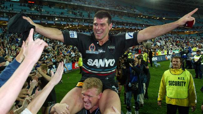 Scott Sattler is chaired around the ground after the Panthers' triumph.