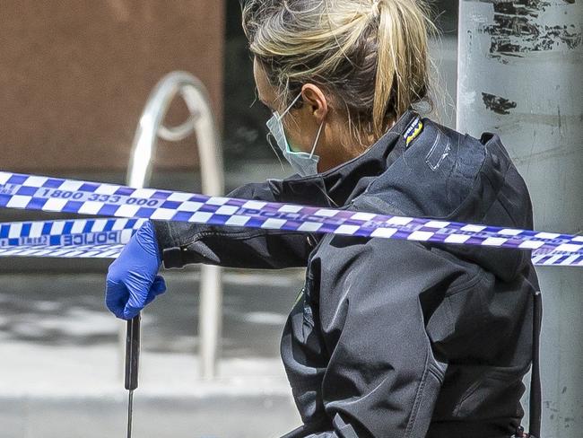 A man with severe stab wounds was rushed to hospital from the Melbourne CBD on Saturday night, with police investigating a series of possibly related events in the city.The 46-year-old was in a life-threatening condition when he was taken to hospital about 9.30pm, a spokeswoman for Victoria Police said.Police had been called to the corner of Bourke Street and King Street to reports of a group of people fighting.There they discovered the man fighting for his life.A 43-year-old woman has been arrested in relation to the stabbing. Picture: Tim Carrafa