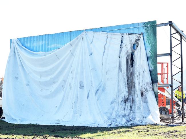 Artist Owen Cavanagh's mural on the side of a Bli Bli shed has  been the subject to graffiti vandalism overnight. Photo Patrick Woods / Sunshine Coast Daily.