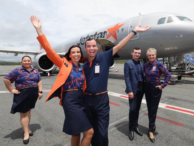 Jetstar aircrew and staff officially launched the new Jetstar uniforms at a media event at Gold Coast Airport, including a fashion show in the aisle of one of their planes. picture Glenn Hampson