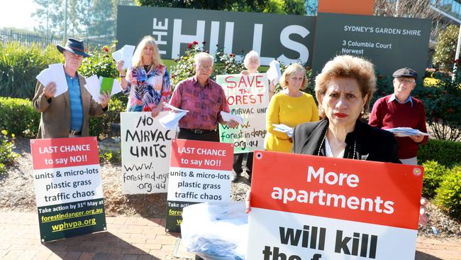 Protestors from the Forest in Danger group at the entrance to the Hills Shire Council Chambers at 3 Columbia Ct Baulkham submit 3000 objection letters for the Mirvac Development at the IBM site. Picture: Angelo Velardo