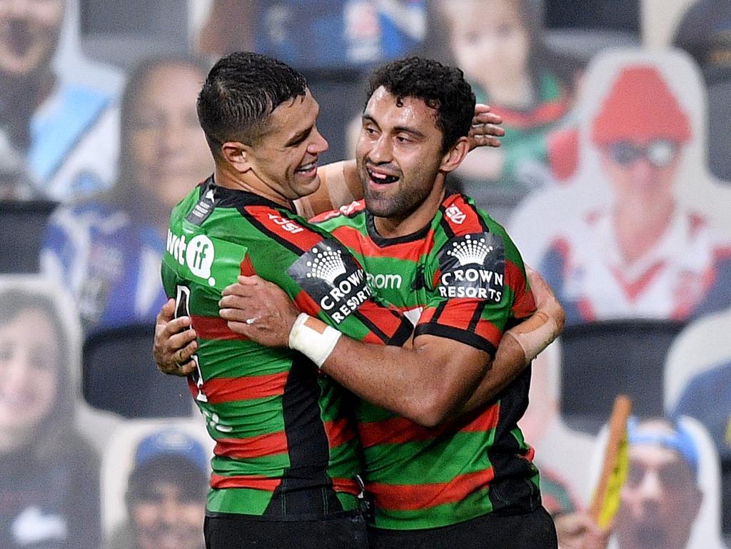 Braidon Burns celebrates with Alex Johnston. Picture: AAP Image/Dan Himbrechts