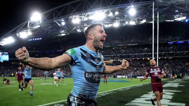 NSW's James Tedesco celebrates winning try with Mitchell Pearce during Game 3 of the State of Origin series between NSW Blues and Queensland at ANZ Stadium, July 10, 2019. Picture. Phil Hillyard