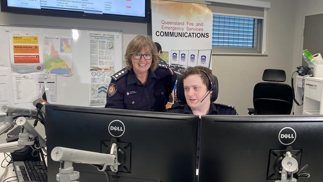 Regional fire communications centre manager, based in Rockhampton, Sheryl Schneider and fire communications officer Jasper.