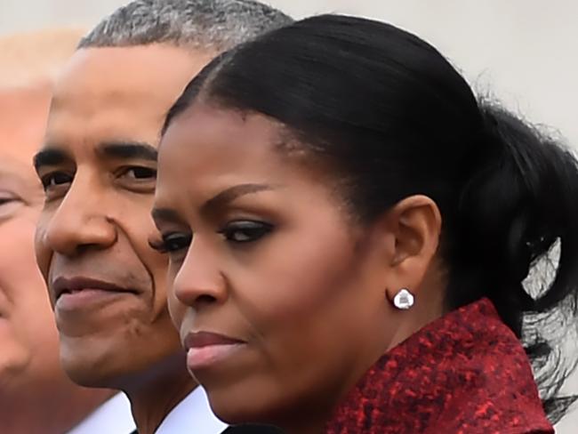 AFP presents a retrospective photo package of 60 pictures marking the 4-year presidency of President Trump.  L-R: First Lady Melania Trump, President Donald Trump,former President Barack Obama, Michelle Obama at the US Capitol after inauguration ceremonies at the in Washington, DC, on January 20, 2017. (Photo by JIM WATSON / AFP)