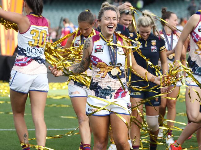 ADELAIDE, AUSTRALIA - APRIL 17: Jessica Wuetschner of the Lions celebrates the win during the 2021 AFLW Grand Final match between the Adelaide Crows and the Brisbane Lions at Adelaide Oval on April 17, 2021 in Adelaide, Australia. (Photo by Sarah Reed/AFL Photos via Getty Images)