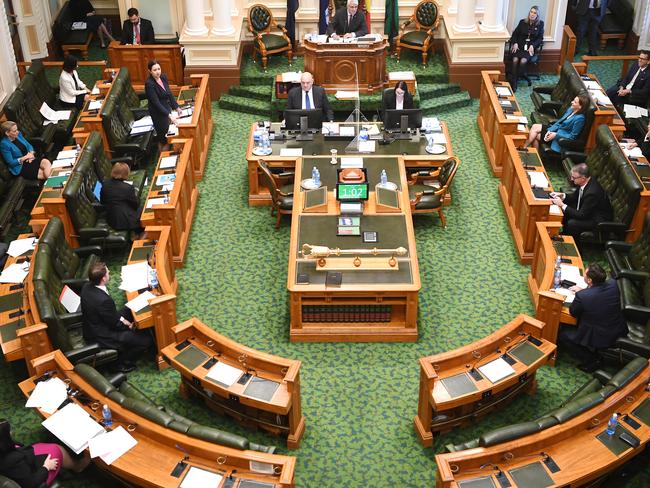 Queensland Premier Annastacia Palaszczuk (top left) addresses a reduced chamber, due to social distancing measures, during Question Time at Queensland Parliament in Brisbane, Wednesday, April 22, 2020. Queensland has recorded no new cases of coronavirus in the past 24 hours. (AAP Image/Dan Peled) NO ARCHIVING