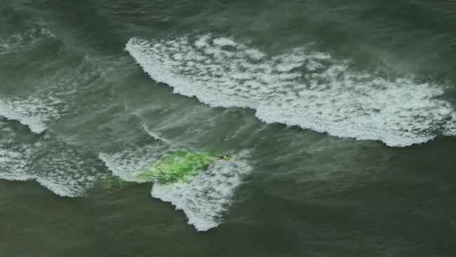 Surf Life Saving Queenslandlaunched a new rip safety campaign this Sunday - DonÕt risk the rip. Lifesavers released fluoro dye into the water at Surfers Paradise to highlight rip current formations,but unfortunately tides and mother nature spoilt the show. Picture Glenn Hampson