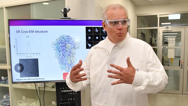 Scott Morrison tours the University of Queensland vaccine lab while campaigning for the LNP on Monday. Picture: Getty Images