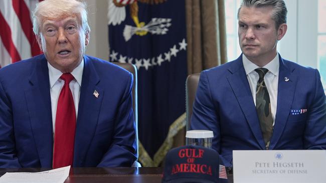 US President Donald Trump and his Defence Secretary Pete Hegseth attend a cabinet meeting at the White House. Picture: AP Photo/Evan Vucci