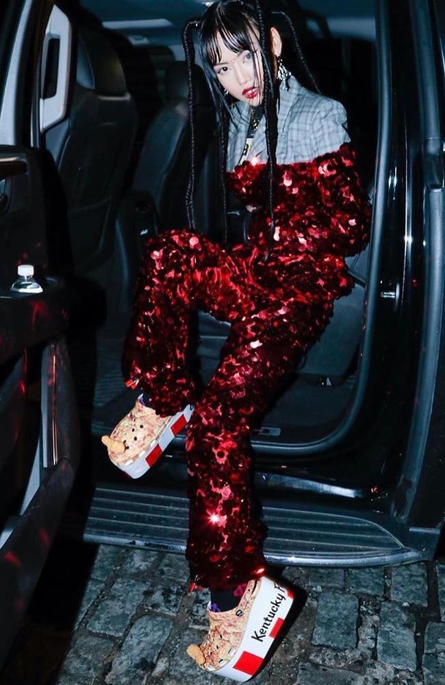 While attending shows during New York Fashion Week, global artist Me Love Me a Lot (MLMA) debuted the sky-high, KFC-themed platform. Picture: Instagram/melovemealot
