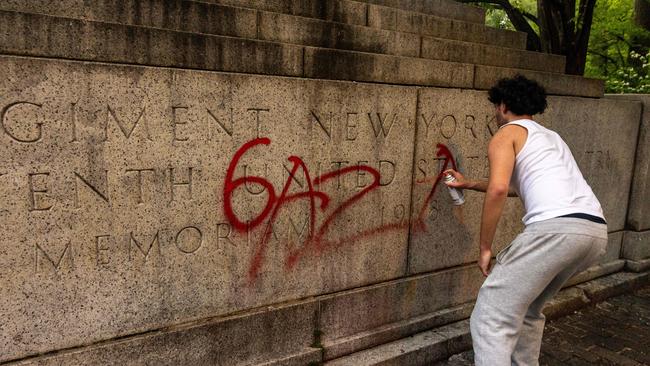 A pro-Palestine protester writes Gaza on a memoriam near Central Park during a march on the outskirts of the Met Gala in New York City. Picture: Alex Kent / AFP