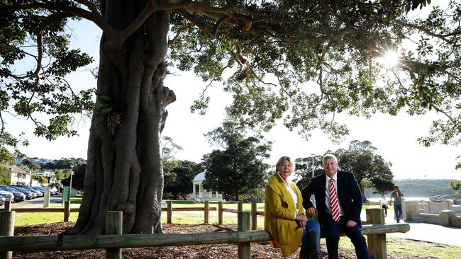 Mosman councillors Libby Moline and Roy Bendall at Balmoral esplanade, which they believe is at risk of becoming like a “cemetery” with the number of memorials everywhere. Picture: Annika Enderborg