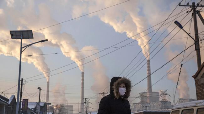 Smoke billows from coal-fired power plant stacks in Shanxi, China. Picture: Getty Images