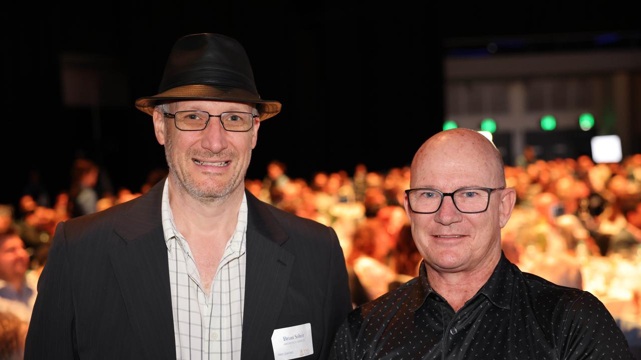 Brian Soheir and Phil Marshall at the TSS Foundation Breakfast, Gold Coast Convention and Exhibition Centre. Picture, Portia Large.