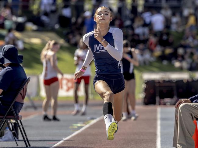 AB Hernandez, a transgender student at Jurupa Valley High School, competes in the qualifying round of long jump at the California high school track-and-field championships. Picture: Stephen Lam/San Francisco Chronicle via AP