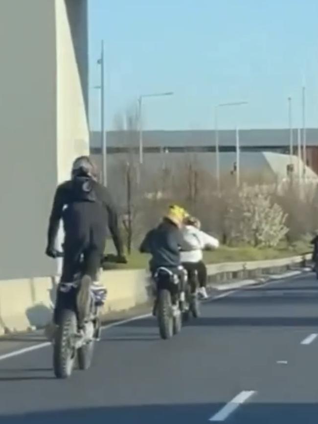 One rider was filmed kneeling on his bike while it was in motion.