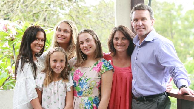 Paul White with his family at home in Bardon in 2011. Emily (19), Annabel (12), Madeline (18) and Molly (14) with wife Angela. Picture: Jono Searle