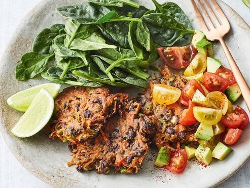 Carrot, black bean and coriander fritters with smoky avocado salsa.