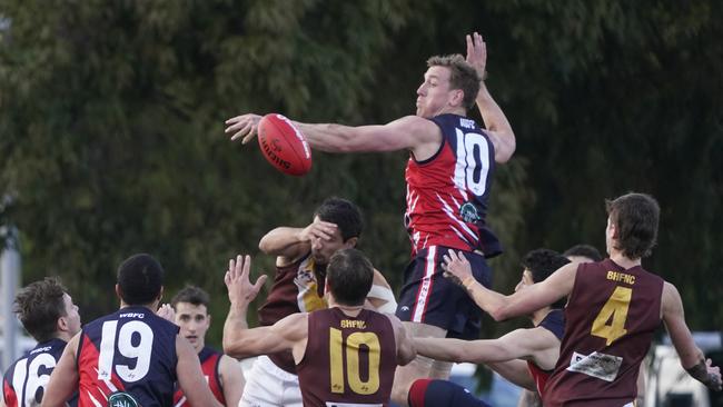 The Blues’ Nick Perry flies for the ball on Saturday. Picture: Valeriu Campan