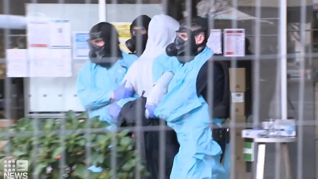 The men allegedly failed to stay in their rooms and wear masks.