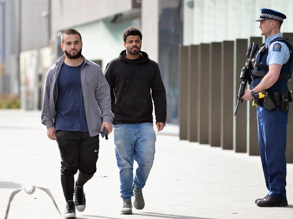 Mustafa Boztas, a survivor of the shootings at Al Noor mosque (left), arrives for the case review hearing in Christchurch. Picture: Getty Images