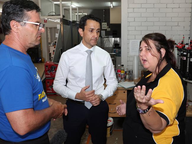 Leader of the Opposition David Crisafulli and Maryborough MP-elect John Barounis talking with victim of crime Belinda Earle, Earles Paint Place, Maryborough. Picture: Liam Kidston