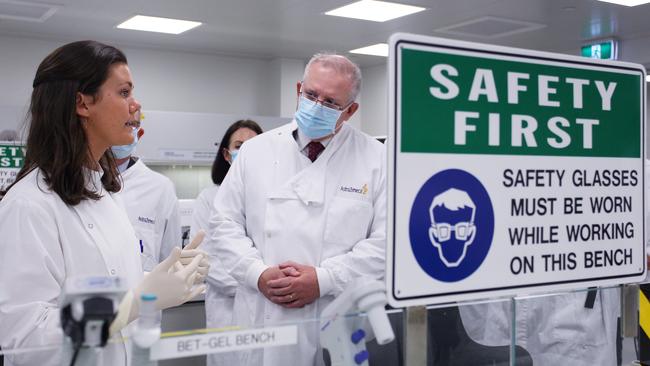 Prime Minister Scott Morrison meets with team member Savannah Alegre, Specialist Team Lead of the Sydney Microbiology Laboratory at AstraZeneca in August. Picture: Getty Images