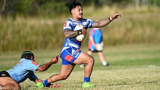 Brothers player Loia Fetaoai tries to escape the Swifts tackler during last weekend's A-Grade thriller at Purga. Brothers won 32-30. Picture: Cordell Richardson